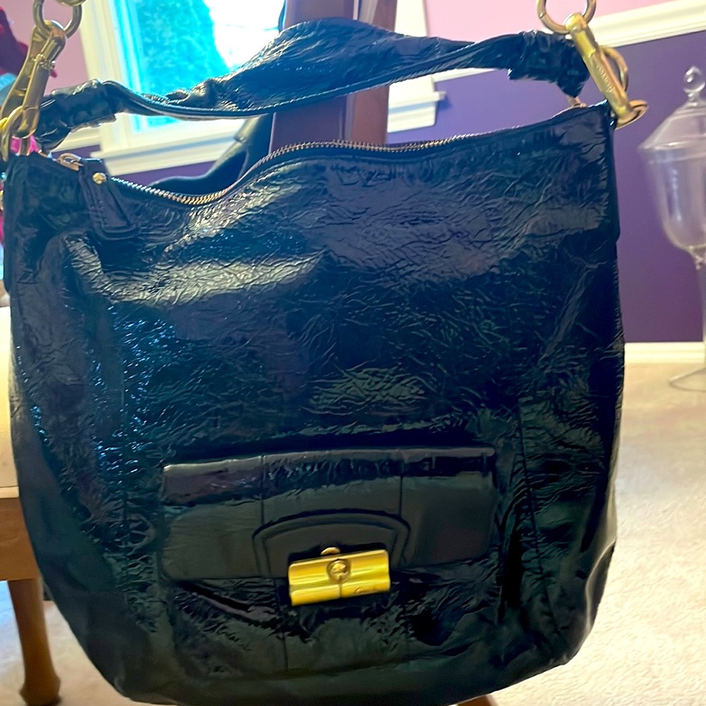 Coach black patent leather hobo bag